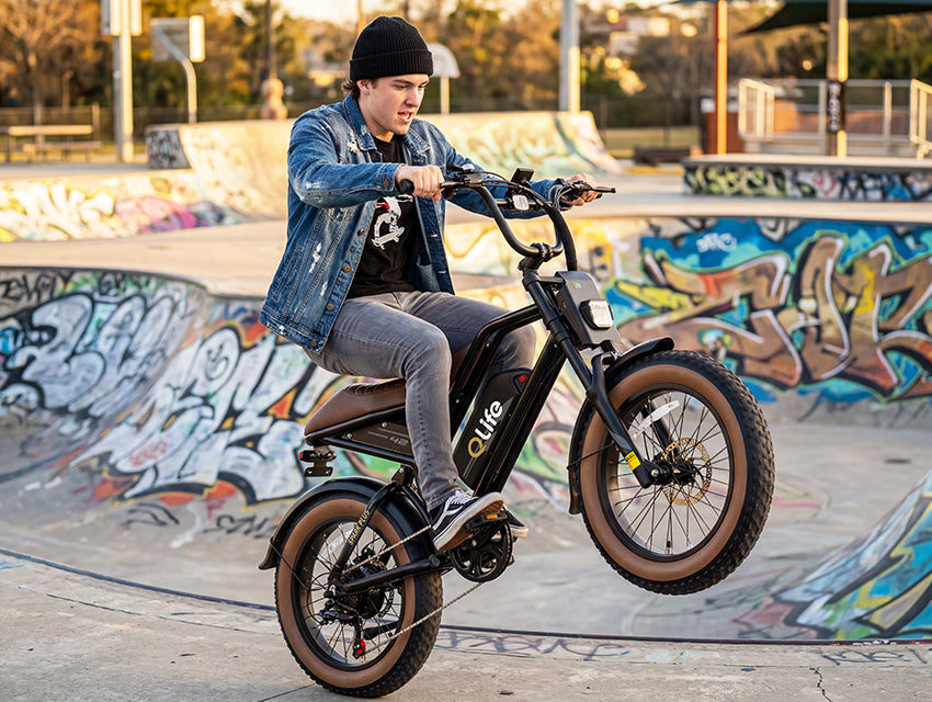 Spark Plus 20x4.0" Hydraulic Brakes Moped-Style E-Bike, Lifestyle Image